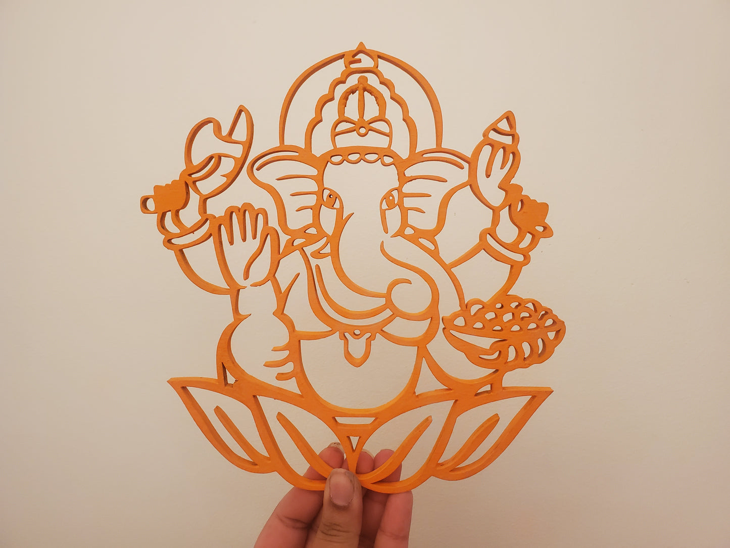 9" natural wood/orange Ganesha on a lotus